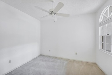 Privacy is delivered in this 2 bedroom, 2 bathroom villa on The Meadows Golf and Country Club in Florida - for sale on GolfHomes.com, golf home, golf lot