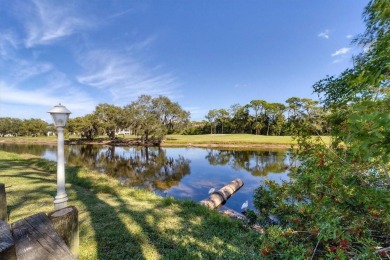 Privacy is delivered in this 2 bedroom, 2 bathroom villa on The Meadows Golf and Country Club in Florida - for sale on GolfHomes.com, golf home, golf lot