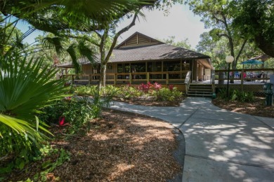 Price reduction! Privacy is delivered in this 2 bedroom, 2 on The Meadows Golf and Country Club in Florida - for sale on GolfHomes.com, golf home, golf lot