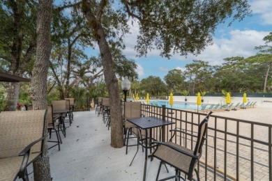 Price reduction! Privacy is delivered in this 2 bedroom, 2 on The Meadows Golf and Country Club in Florida - for sale on GolfHomes.com, golf home, golf lot