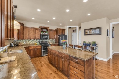 You'll be welcomed into this stunning home with tall ceilings on Glen Eagle Golf Course in Utah - for sale on GolfHomes.com, golf home, golf lot