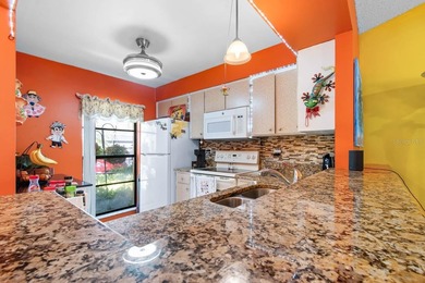 Welcome to easy, resort-style living in the sought-after Kings on Kings Point Executive Golf Course in Florida - for sale on GolfHomes.com, golf home, golf lot