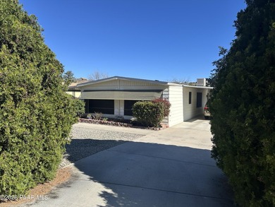 Located in the golf course community of Prescott Country Club on Prescott Golf and Country Club in Arizona - for sale on GolfHomes.com, golf home, golf lot