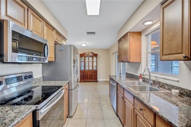 Welcome to this beautifully updated 2 bedroom 2 bath home on Highland Lakes Executive Golf Course in Florida - for sale on GolfHomes.com, golf home, golf lot