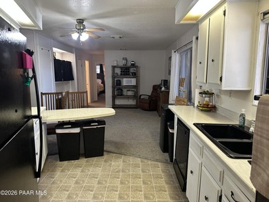 Located in the golf course community of Prescott Country Club on Prescott Golf and Country Club in Arizona - for sale on GolfHomes.com, golf home, golf lot