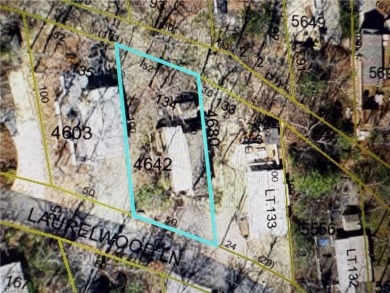 Lot #134 located in the private gated community of Greenstreet on Stone Mountain Golf Club in North Carolina - for sale on GolfHomes.com, golf home, golf lot