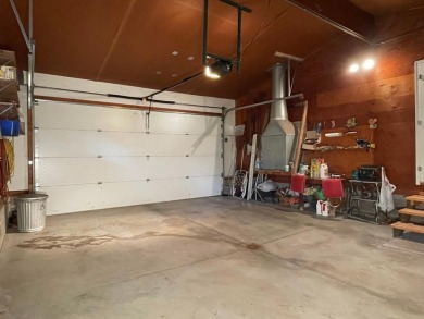 Explore a meticulously maintained 3-bedroom, 1.5-bathroom home on Plum Lake Golf Club in Wisconsin - for sale on GolfHomes.com, golf home, golf lot