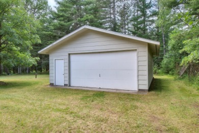 Explore a meticulously maintained 3-bedroom, 1.5-bathroom home on Plum Lake Golf Club in Wisconsin - for sale on GolfHomes.com, golf home, golf lot