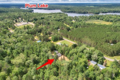 Explore a meticulously maintained 3-bedroom, 1.5-bathroom home on Plum Lake Golf Club in Wisconsin - for sale on GolfHomes.com, golf home, golf lot