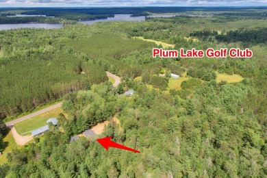 Explore a meticulously maintained 3-bedroom, 1.5-bathroom home on Plum Lake Golf Club in Wisconsin - for sale on GolfHomes.com, golf home, golf lot