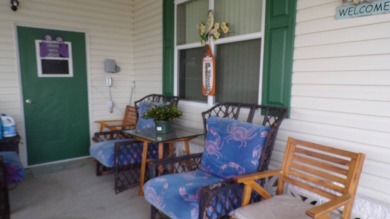 This charming three-bedroom Palm Harbor home offers an idyllic on Schalamar Creek Golf and Country Club in Florida - for sale on GolfHomes.com, golf home, golf lot