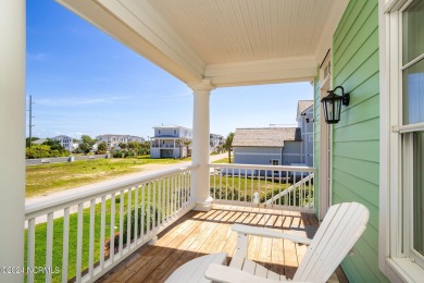 Oceanfront retreat in Roosevelt Beach offered fully furnished on The Country Club of the Crystal Coast in North Carolina - for sale on GolfHomes.com, golf home, golf lot