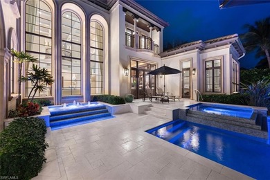 From the moment you enter, this home's expansive windows on Grey Oaks Golf and Country Club in Florida - for sale on GolfHomes.com, golf home, golf lot