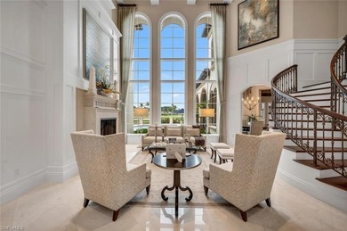 From the moment you enter, this home's expansive windows on Grey Oaks Golf and Country Club in Florida - for sale on GolfHomes.com, golf home, golf lot