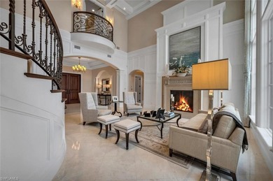 From the moment you enter, this home's expansive windows on Grey Oaks Golf and Country Club in Florida - for sale on GolfHomes.com, golf home, golf lot