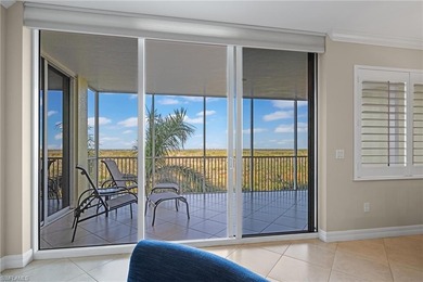 Wake up to breathtaking views of the lake, golf course, Estero on West Bay Beach and Golf Club in Florida - for sale on GolfHomes.com, golf home, golf lot