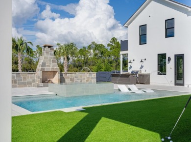 Experience refined coastal living at its finest in this on Camp Creek Golf Course in Florida - for sale on GolfHomes.com, golf home, golf lot
