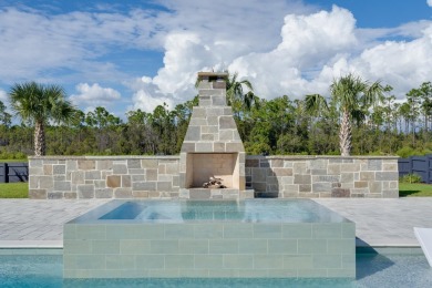 Experience refined coastal living at its finest in this on Camp Creek Golf Course in Florida - for sale on GolfHomes.com, golf home, golf lot