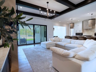 Experience refined coastal living at its finest in this on Camp Creek Golf Course in Florida - for sale on GolfHomes.com, golf home, golf lot