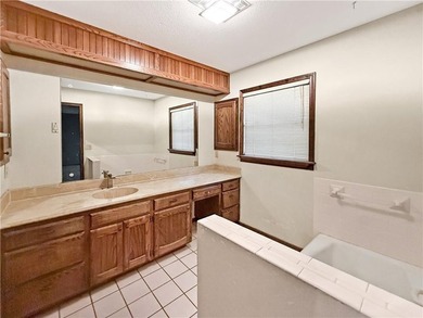 Looking for a one-of-a-kind home? Don't miss this house on a on Fayetteville Country Club in Arkansas - for sale on GolfHomes.com, golf home, golf lot