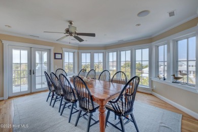 This striking seven bedroom, 7  1/2  bathroom home exudes on Bald Head Island Golf Club in North Carolina - for sale on GolfHomes.com, golf home, golf lot