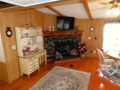 HEY, when I retire I want to live in a log cabin with a on Betmar Acres Golf Club in Florida - for sale on GolfHomes.com, golf home, golf lot