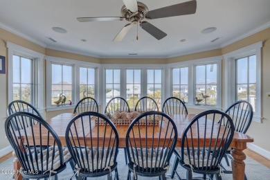 This striking seven bedroom, 7  1/2  bathroom home exudes on Bald Head Island Golf Club in North Carolina - for sale on GolfHomes.com, golf home, golf lot