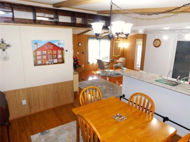 HEY, when I retire I want to live in a log cabin with a on Betmar Acres Golf Club in Florida - for sale on GolfHomes.com, golf home, golf lot