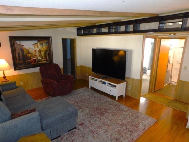 HEY, when I retire I want to live in a log cabin with a on Betmar Acres Golf Club in Florida - for sale on GolfHomes.com, golf home, golf lot