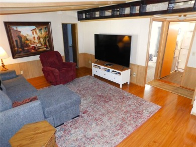 HEY, when I retire I want to live in a log cabin with a on Betmar Acres Golf Club in Florida - for sale on GolfHomes.com, golf home, golf lot