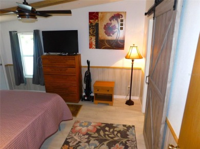 HEY, when I retire I want to live in a log cabin with a on Betmar Acres Golf Club in Florida - for sale on GolfHomes.com, golf home, golf lot