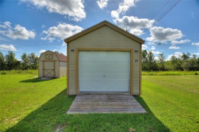 Charming 3 Bedroom, 2 Bath Pool Home in Indian Lake Estates, a on Indian Lake Estates Golf and Country Club in Florida - for sale on GolfHomes.com, golf home, golf lot