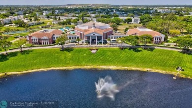 WATER VIEW! Indulge in this luxury 2 bed, 2 bath condo nestled on Hillsboro Pines Golf in Florida - for sale on GolfHomes.com, golf home, golf lot