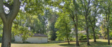 This stunning 1.86-acre property on The Grande Golf course on Grande Golf Club in Michigan - for sale on GolfHomes.com, golf home, golf lot