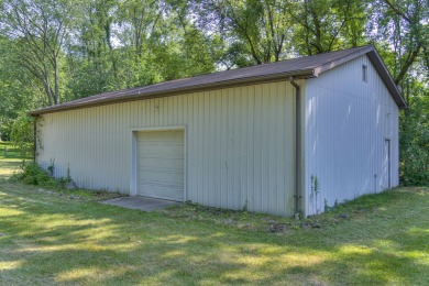 This stunning 1.86-acre property on The Grande Golf course on Grande Golf Club in Michigan - for sale on GolfHomes.com, golf home, golf lot