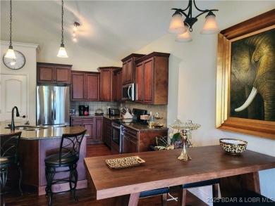 ? A COVETED BELLTOWER VILLA WITH BOAT SLIP! ? Rare opportunity on The Club At Old Kinderhook in Missouri - for sale on GolfHomes.com, golf home, golf lot