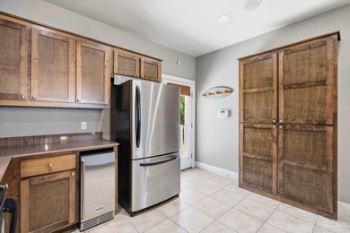 Experience coastal luxury in this beautifully designed 5-bedroom on Kiva Dunes Golf Club in Alabama - for sale on GolfHomes.com, golf home, golf lot