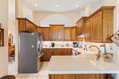 Welcome to this beautifully maintained 3 bedroom, 2 bath pool on The Grand Club Cypress Course in Florida - for sale on GolfHomes.com, golf home, golf lot