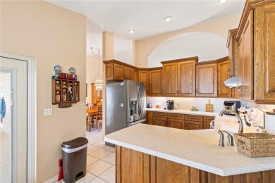 Welcome to this beautifully maintained 3 bedroom, 2 bath pool on The Grand Club Cypress Course in Florida - for sale on GolfHomes.com, golf home, golf lot