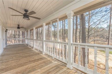 Welcome to this charming 3-bedroom, 3-bathroom cottage nestled on Reynolds Lake Oconee - The Oconee in Georgia - for sale on GolfHomes.com, golf home, golf lot