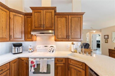 Welcome to this beautifully maintained 3 bedroom, 2 bath pool on The Grand Club Cypress Course in Florida - for sale on GolfHomes.com, golf home, golf lot