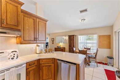 Welcome to this beautifully maintained 3 bedroom, 2 bath pool on The Grand Club Cypress Course in Florida - for sale on GolfHomes.com, golf home, golf lot