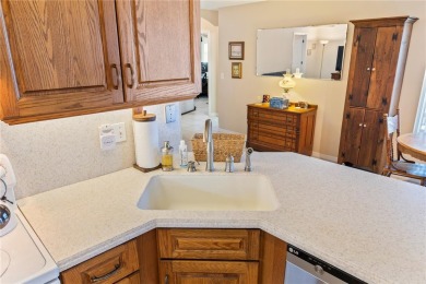 Welcome to this beautifully maintained 3 bedroom, 2 bath pool on The Grand Club Cypress Course in Florida - for sale on GolfHomes.com, golf home, golf lot