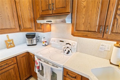 Welcome to this beautifully maintained 3 bedroom, 2 bath pool on The Grand Club Cypress Course in Florida - for sale on GolfHomes.com, golf home, golf lot