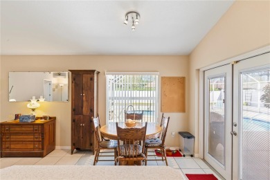 Welcome to this beautifully maintained 3 bedroom, 2 bath pool on The Grand Club Cypress Course in Florida - for sale on GolfHomes.com, golf home, golf lot