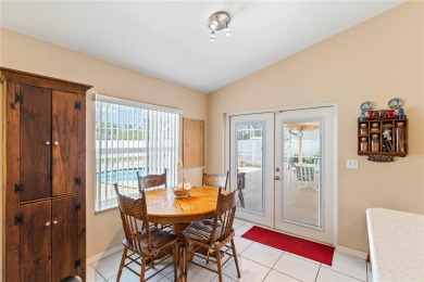 Welcome to this beautifully maintained 3 bedroom, 2 bath pool on The Grand Club Cypress Course in Florida - for sale on GolfHomes.com, golf home, golf lot