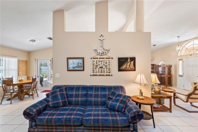 Welcome to this beautifully maintained 3 bedroom, 2 bath pool on The Grand Club Cypress Course in Florida - for sale on GolfHomes.com, golf home, golf lot