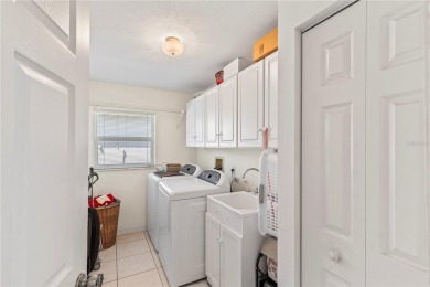 Welcome to this beautifully maintained 3 bedroom, 2 bath pool on The Grand Club Cypress Course in Florida - for sale on GolfHomes.com, golf home, golf lot