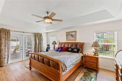 Welcome to this beautifully maintained 3 bedroom, 2 bath pool on The Grand Club Cypress Course in Florida - for sale on GolfHomes.com, golf home, golf lot