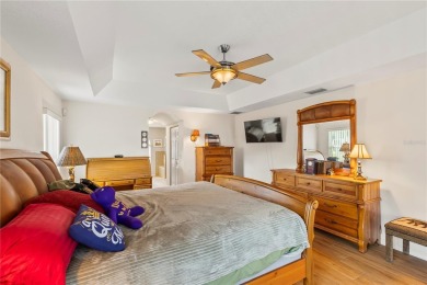 Welcome to this beautifully maintained 3 bedroom, 2 bath pool on The Grand Club Cypress Course in Florida - for sale on GolfHomes.com, golf home, golf lot